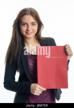 Ragazza giovane con bewerbungsmappe Foto Stock