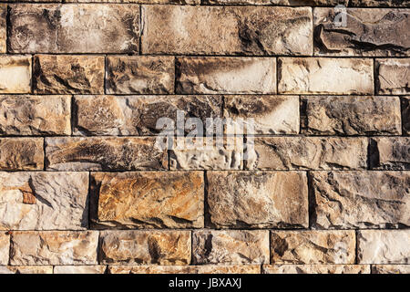 Parete composta da rettangolare dei blocchi di granito, sfondo texture o elemento di design Foto Stock