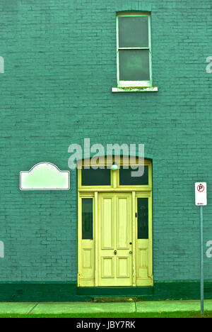 Il verde antico muro, parte di un edificio Foto Stock