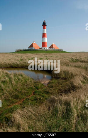 Germania, SCHLESWIG-HOLSTEIN, Westerhever, penisola Eiderstedt, Lighthouse, il faro Westerheversand, parco nazionale di velme, Deutschland, Schles Foto Stock