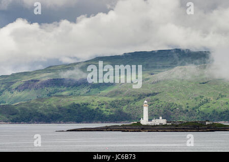 Eilean Musdile faro sul modo per il Isle of Mull nelle Ebridi Interne Foto Stock