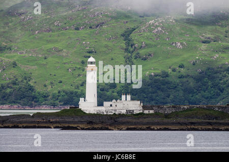 Eilean Musdile faro sul modo per il Isle of Mull nelle Ebridi Interne Foto Stock