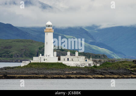 Eilean Musdile faro sul modo per il Isle of Mull nelle Ebridi Interne Foto Stock