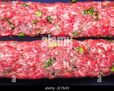 Materie rosso carne a terra realizzata in shish kebab Foto Stock