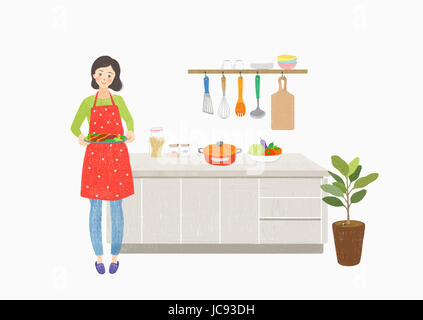 Donna sorridente con il cibo in piedi in cucina Foto Stock