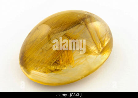 Cabochon in quarzo con golden rutilos interno Foto Stock