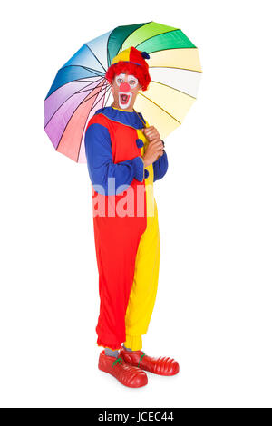 Ritratto di un clown con Multi ombrello colorato su sfondo bianco Foto Stock