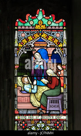 Caporale atti di misericordia finestra, vetrate di Federico Preedy, 1868, visitando i malati, Gunthorpe, Norfolk, Inghilterra, Regno Unito Foto Stock