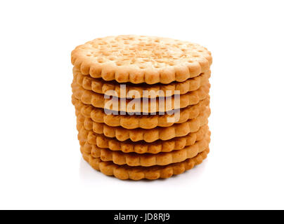 Biscotti - una pila di grano deliziosi biscotti rotondo isolato su bianco Foto Stock