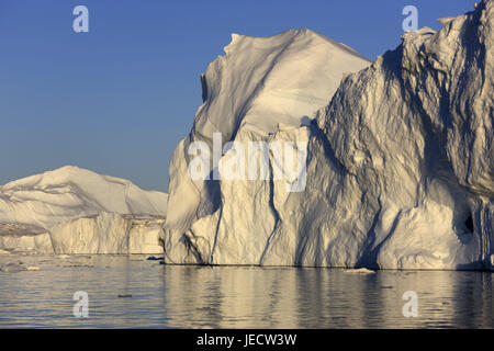 La Groenlandia, Discoteca Bay, Ilulissat, Fjord, iceberg, dettaglio, Groenlandia occidentale, ghiaccio, ghiacciaio, l'Artico, estate, mirroring, superficie di acqua, solitudine, deserte, la luce della sera, la deriva del ghiaccio, Ilulissat Tourist Nature-gelato fiordo, patrimonio mondiale dell UNESCO, gelato fiordo, Foto Stock