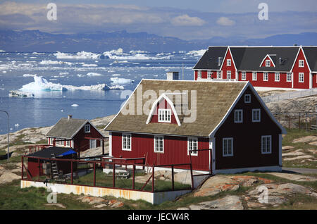 La Groenlandia, Discoteca Bay, Ilulissat, fiordo, case in legno, visualizzare, iceberg, Groenlandia occidentale, rive, costa, fuori, deserte, acqua, sul mare Artico, ghiaccio, ghiaccio di moto, cambiamenti climatici, case, case, rosso, architettura, tipicamente per paese, Foto Stock