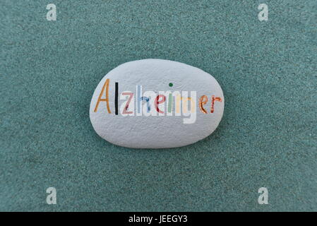 Malattia di Alzheimer nome dipinta su una pietra Foto Stock