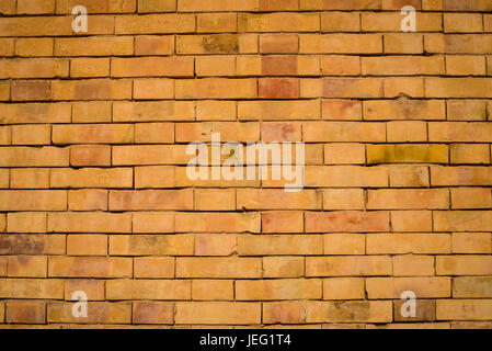 Telaio completo di prendere un arancio muro di mattoni Foto Stock