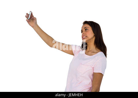 Ragazza tenendo un selfie Foto Stock