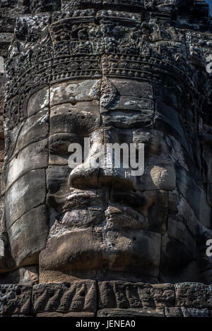 Scolpita in pietra faccia, tempio Bayon, Angkor Wat, Cambogia Foto Stock