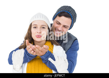 Coppia felice soffiando kiss Foto Stock