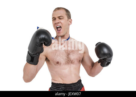 Boxer che indossa la medaglia di eseguire la presa di posizione di inscatolamento Foto Stock