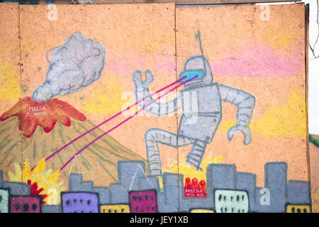 Robot con il laser distruttivo occhi, Graffiti wall art a Reykjavik, Islanda Foto Stock