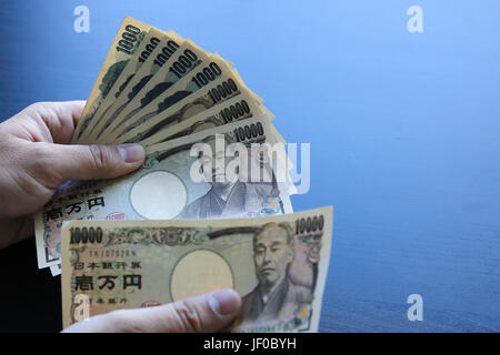 Note di yen concetto di denaro background Closeup della moneta giapponese yen bank Foto Stock