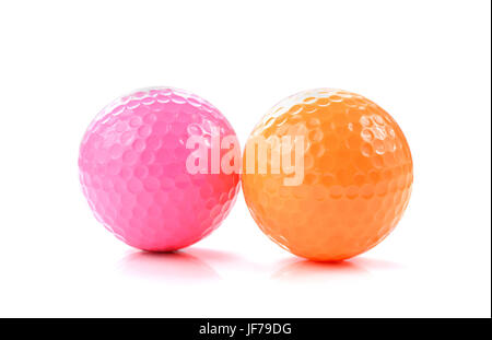 Rosa e Arancio miniatura pallina da golf su sfondo bianco Foto Stock
