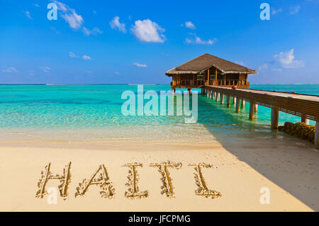 Parola Haiti sulla spiaggia Foto Stock