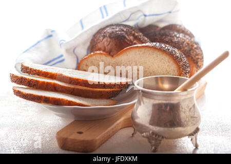 Trecciato Challah pane e miele Foto Stock