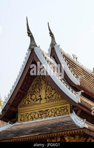 Dettaglio del Haw Pha Bang tempio presso il Palazzo Reale di motivi a Luang Prabang, Laos, Asia Foto Stock