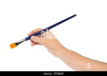 Mano con pennello Foto Stock