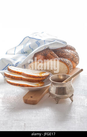 Trecciato Challah pane e miele Foto Stock