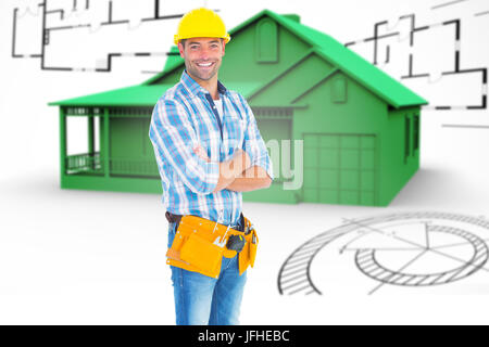 Immagine composita del ritratto di lavoratore manuale in piedi con le braccia incrociate Foto Stock