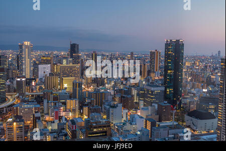 Giappone, città di Osaka, Fukushima Ku district, tramonto Foto Stock