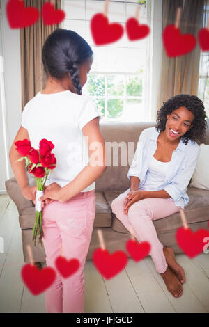 Immagine composita della figlia dando le rose a sua madre Foto Stock