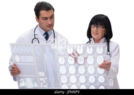 Due medici guardando immagine a raggi x isolato su bianco Foto Stock