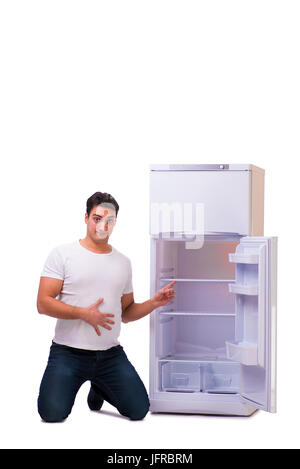 L'uomo in cerca di cibo in frigo vuoto Foto Stock