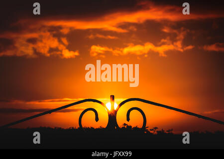 Tramonto al gate di storta Foto Stock