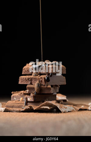 Il cioccolato al latte spruzzato con sciroppo Foto Stock