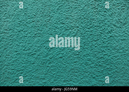 Verde smeraldo dipinti a muro in stucco. Texture di sfondo. Foto Stock