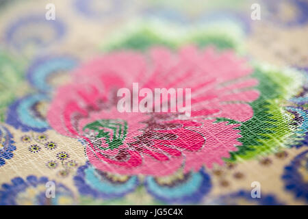 Chiusura del motivo floreale in tessuto vintage Foto Stock
