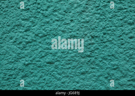 Verde smeraldo dipinti a muro in stucco. Texture di sfondo. Foto Stock