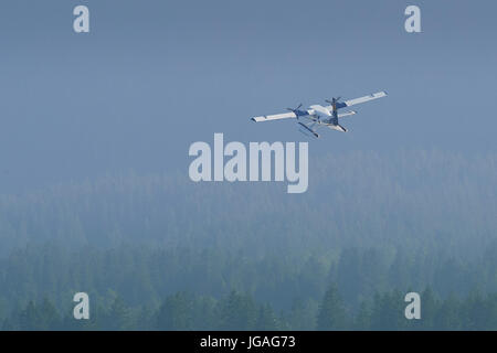 Porto aria idrovolanti de Havilland DHC-6 Twin Otter la scalata al di fuori del porto di Vancouver aeroporto acqua, British Columbia, Canada. Foto Stock