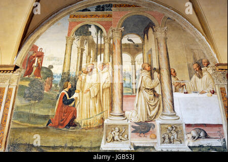 Affreschi rinascimentali, vita di san Benedetto, dipinto di il sodoma, lato Sud del Grande Chiostro, Abbazia di Monte Oliveto maggiore, Toscana, Italia Foto Stock