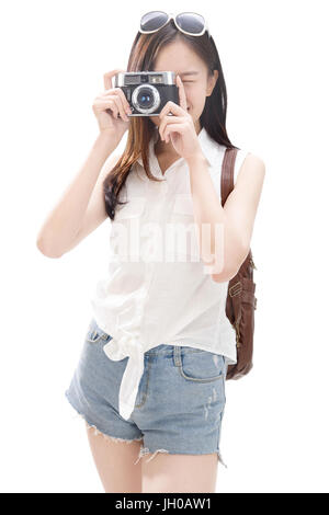 Giovane donna sul viaggio di scattare le foto Foto Stock