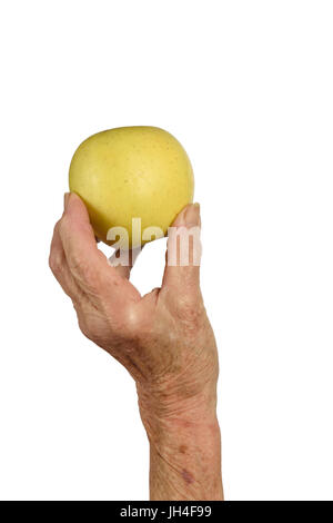 Mano di donna senior e apple isolato su bianco Foto Stock