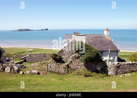 Bianche Idyllic cottage sulla costa Foto Stock