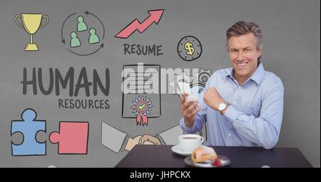 Digital composito di Happy business man a una scrivania utilizzando un telefono contro uno sfondo grigio con grafica Foto Stock