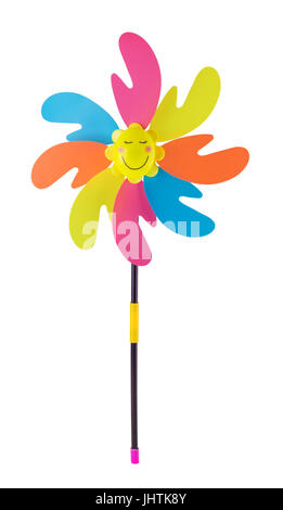 Il mulino a vento di plastica giocattolo per bambini è isolato su sfondo bianco Foto Stock