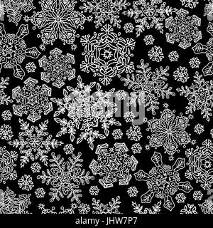 Fiocchi di neve perfetta pattern. Bianco su nero, vettore EPS8 Illustrazione Vettoriale