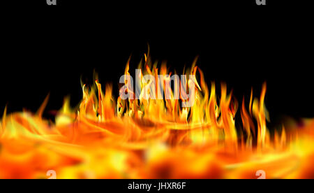 In prossimità di fiamme di fuoco isolati su sfondo nero Foto Stock
