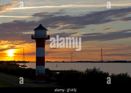 Il tramonto sopra fiume Elba vicino Luehe, Altes Land Bassa Sassonia, Germania Foto Stock