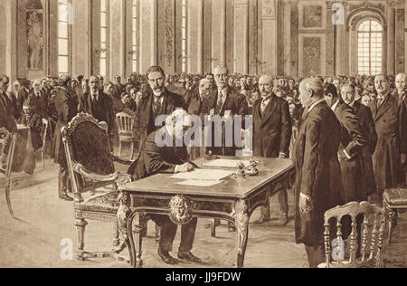 Lloyd George la firma del trattato di Versailles, 28 giugno 1919 Foto Stock